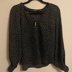 Long sleeve blouse with white small dots.